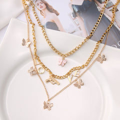 Chain Butterfly Necklace Set for Women – Multilayer Pendant with Bow, Love & Pistol Design